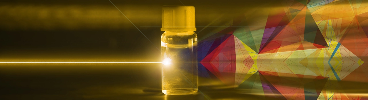 Dispersión de la luz a través de un vial de reactivo